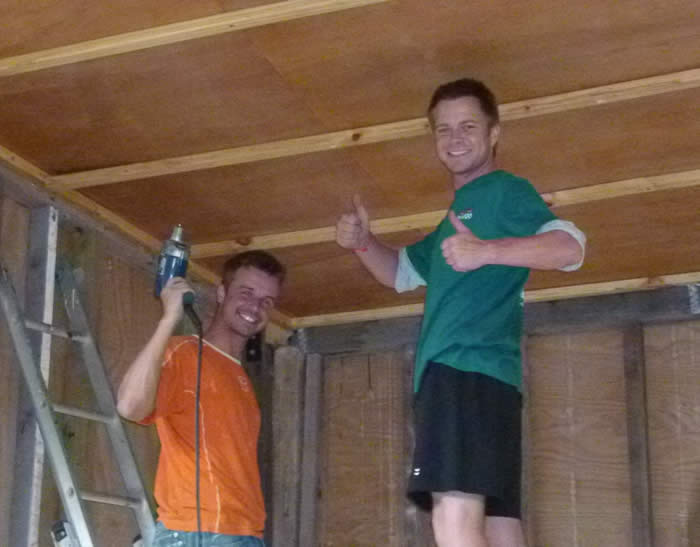 Erik and Denis putting the ceiling on the office